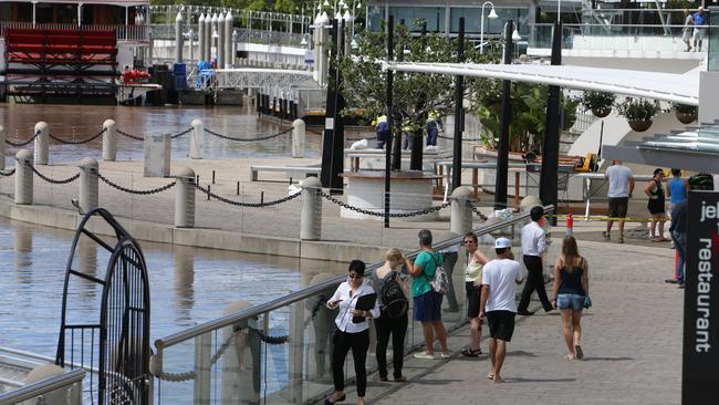 January 2013: Brisbane River peaking around Eagle Street Pier. Picture: Pete Wallis