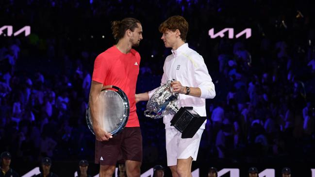 Sinner did his best to console Zverev. (Photo by Quinn Rooney/Getty Images)