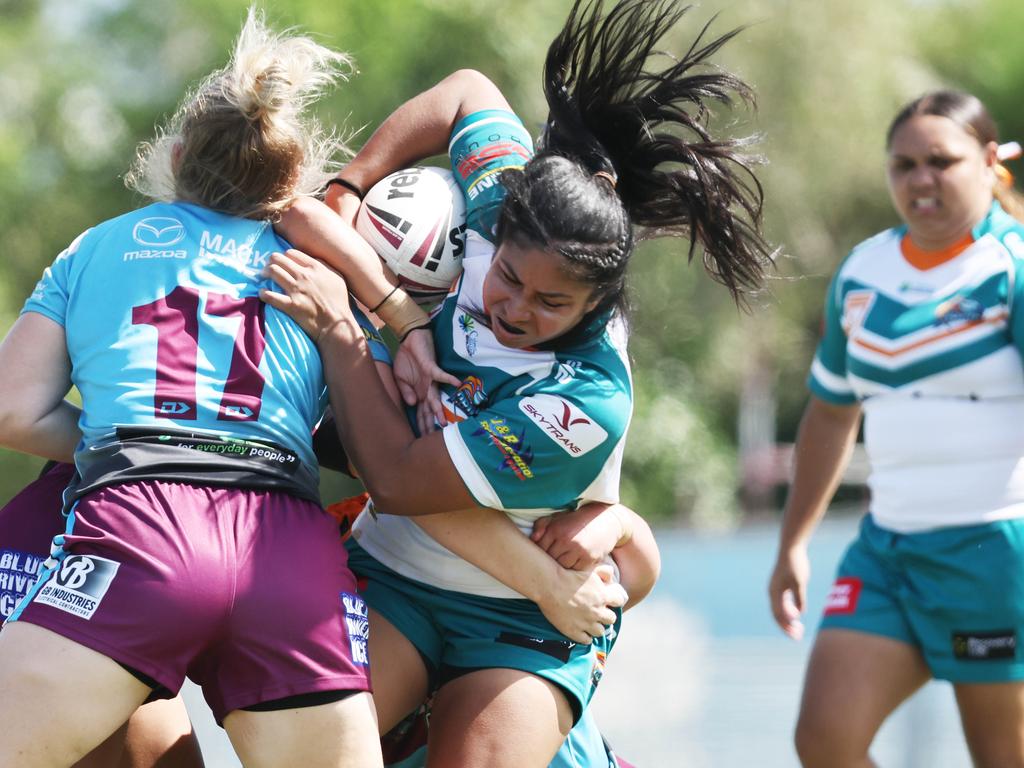 Mariah Tihopu is hit hard in the Queensland Rugby League (QRL) Under 19 Women's match between the Northern Pride and the Mackay Cutters, held at Barlow Park. Picture: Brendan Radke