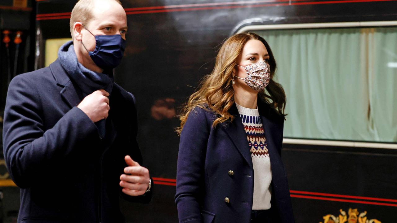 Prince William and Kate Middleton disembark the royal train as they arrive at Manchester Victoria station. Picture: Phil Noble/AFP