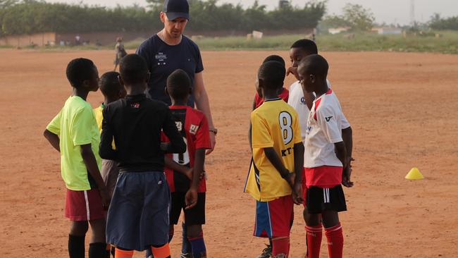 Image received for Pride of Australia Mosman Daily nominee David Oswell of Their Beautiful Game, November 2017. Pictured, David in one of the underprivileged overseas communities which has benefited from donations of football gear and equipment through his charity. David is also a football coach.