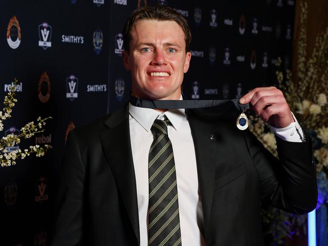 The VFL’s 2024 JJ Liston Trophy winner, Dom Brew, poses with his medal. Picture: Morgan Hancock/AFL Photos/via Getty Images