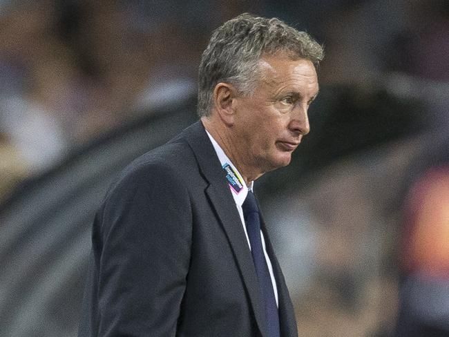 Ernie Merrick has called on two-footed challenges to be outlawed from the game.
