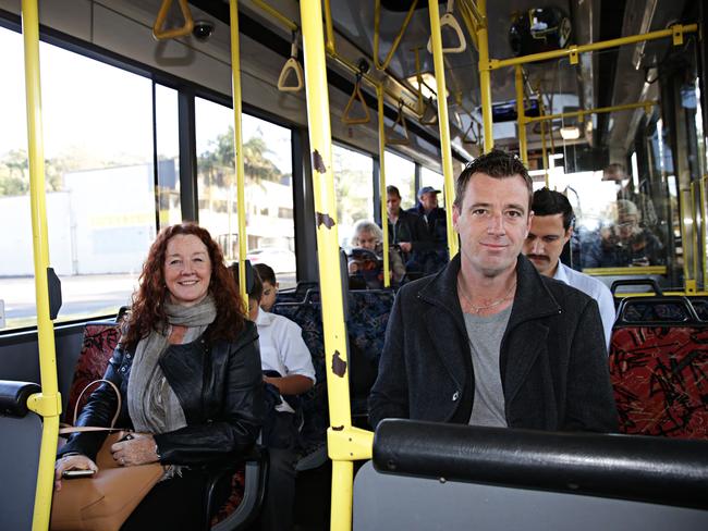 Northern Beaches Councilor Kylie Ferguson and Mayor Michael Regan on a bus. Picture: Adam Yip.