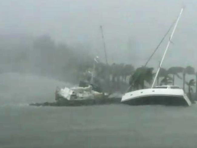 Boats were ripped from their moorings at Hamilton Island during Cyclone Debbie.