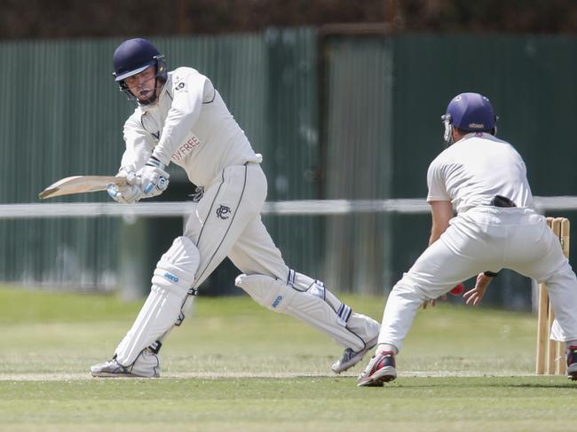 Premier Cricket: Melbourne v Prahran played at Roy Street Ground, Melbourne. Prahran batsman Adam Bull and Melbourne keeper Sam Harper. Picture: Valeriu Campan