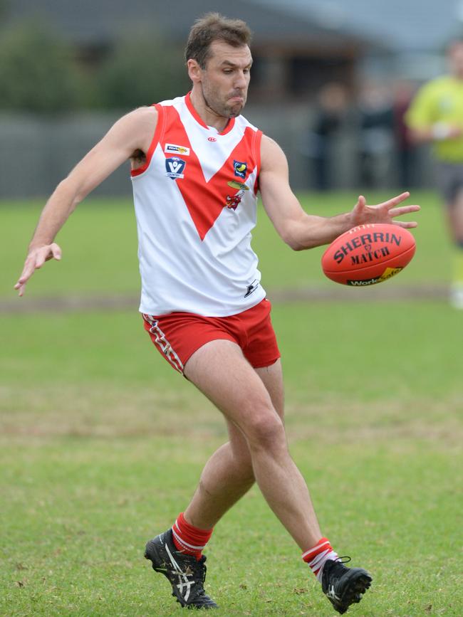 Karingal champion Luke Van Raay snaps a goal in his 300th game last season.