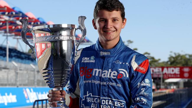 REVVED UP: South Australian Supercars rookie Todd Hazelwood unveils the new Adelaide 500 trophy in pit straight. <b>Picture: </b>CALUM ROBERTSON