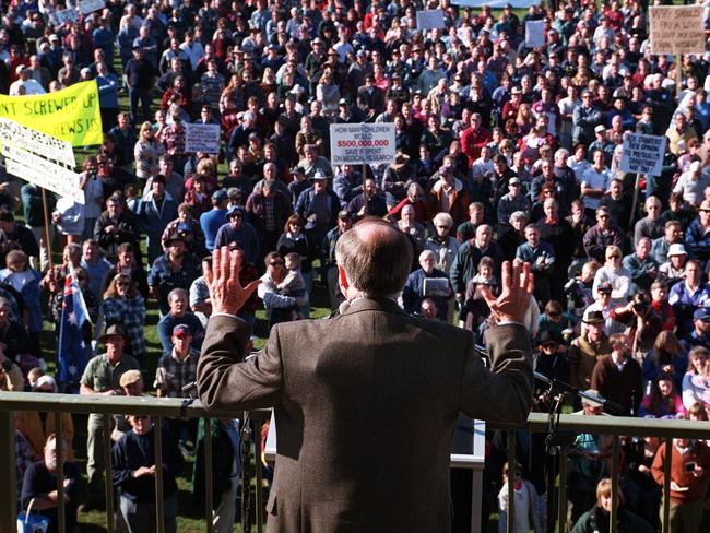 John Howard confronts pro-gun supporters while wearing a bulletproof vest in Victoria in 1996. Picture: Ray Strange