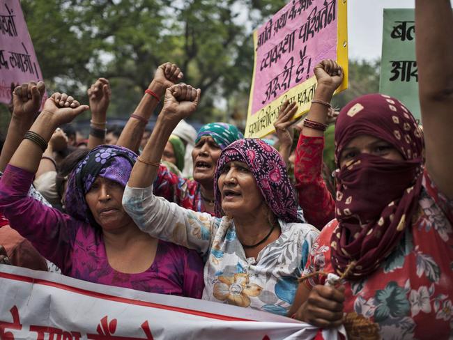 Indian Dalit women protest against a gang-rape of four Dalit girls. AP Photo/Tsering Topgyal