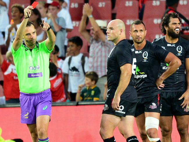 JOHANNESBURG, SOUTH AFRICA - MARCH 18: Referee Mike Fraser gives Quade Cooper of the Reds a red card during the Super Rugby match between Emirates Lions and Reds at Emirates Airlines Park on March 18, 2017 in Johannesburg, South Africa. (Photo by Lee Warren/Gallo Images/Getty Images)