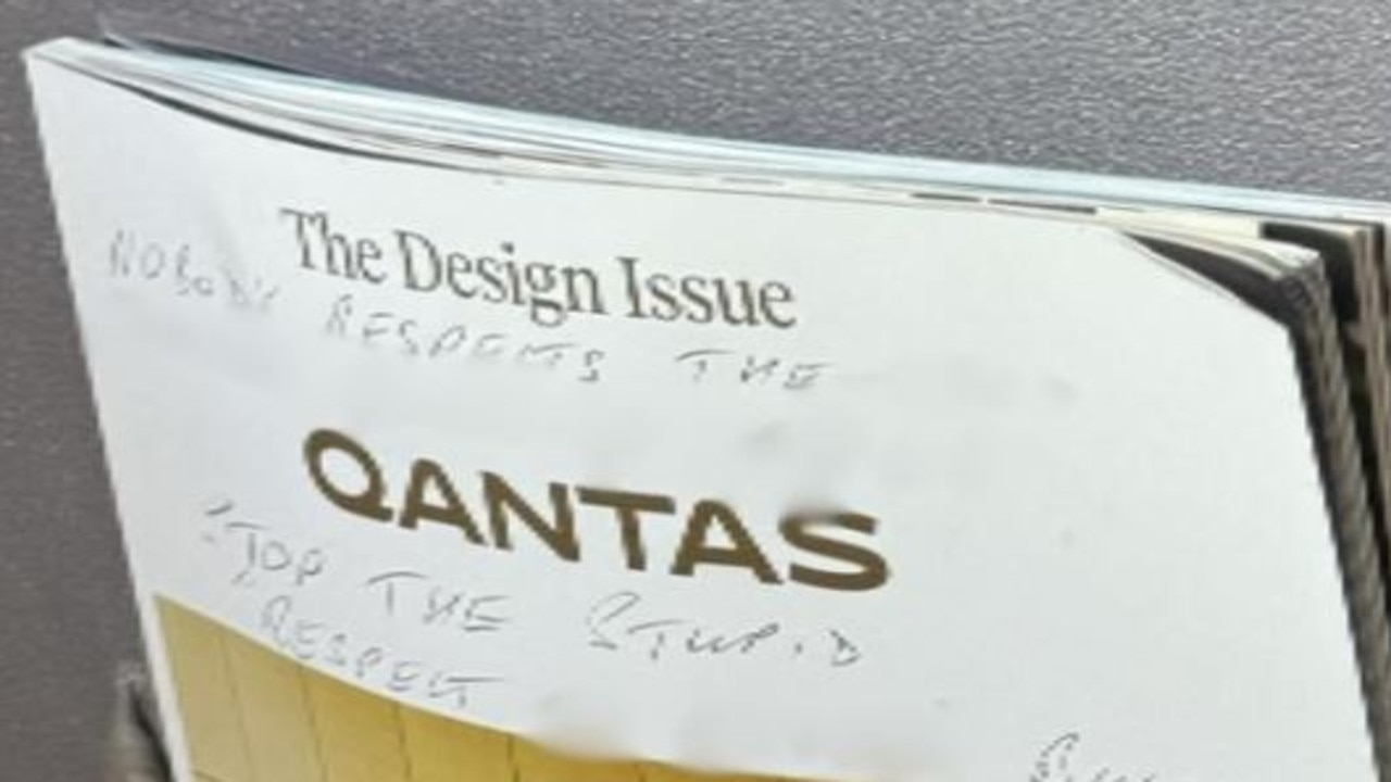 Despicable message scrawled on Qantas mag