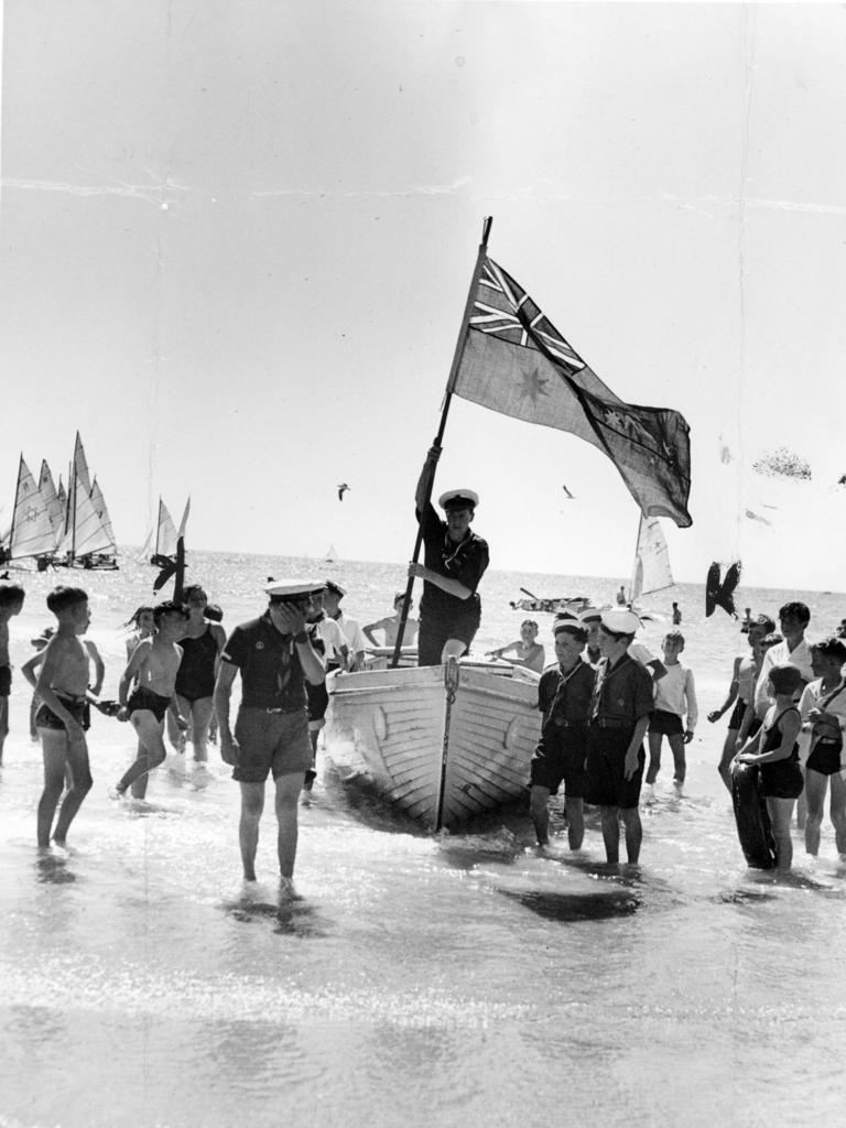 1950. The flag is brought ashore during Australia Day celebrations at Frankston.