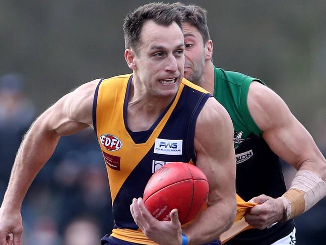 Adam Iacobbuci of Strathmore gets a centre clearance during the EDFL footy: Strathmore v Greenvale match played at Strathmore on Saturday 24th August, 2019.