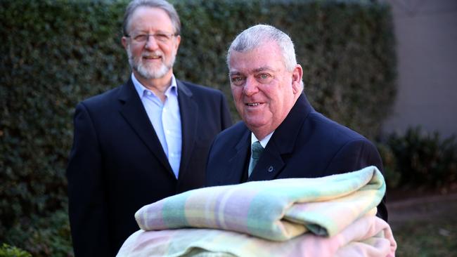 Executive officer of St Vincent De Paul Society Graeme Roche and Guardian Funerals’ location manager Greg Baxter. Picture: Angelo Velardo