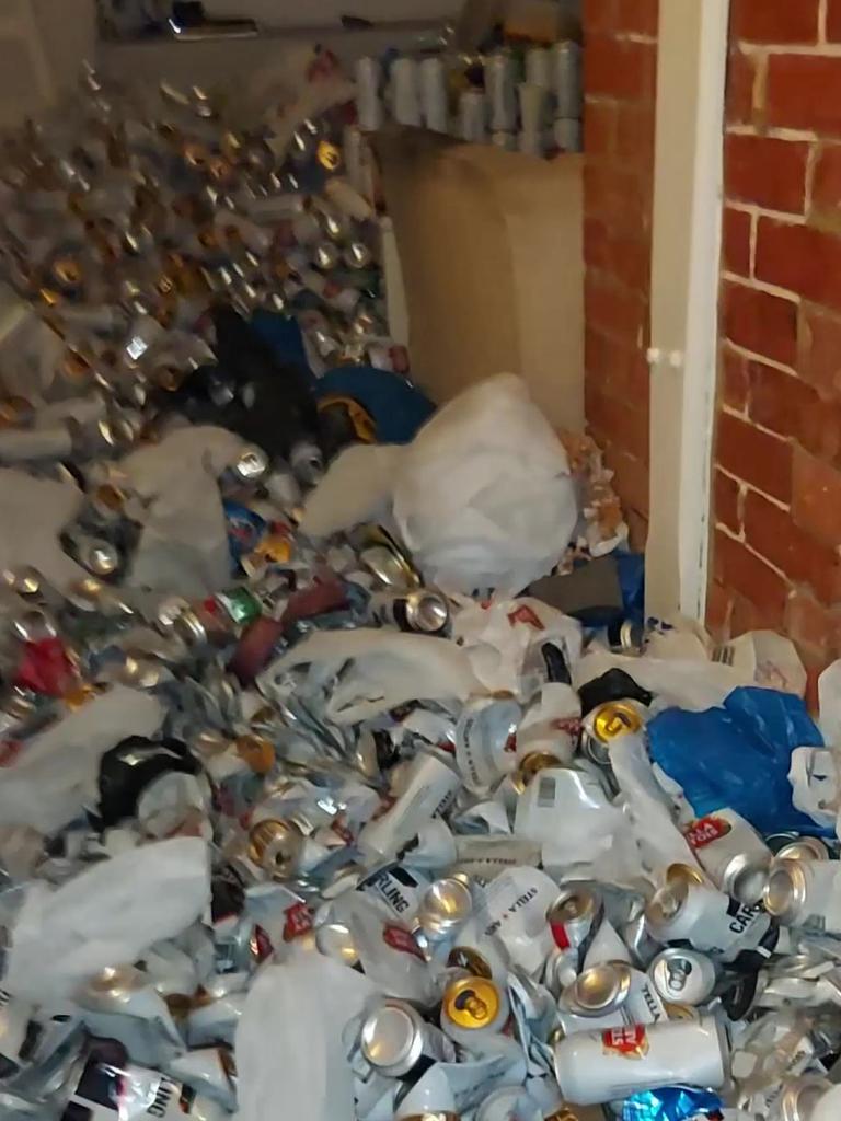 Upstairs there were bin bags full of cigarette ends and you couldn’t see the floor because there were that many beer cans. Picture: Kennedy News