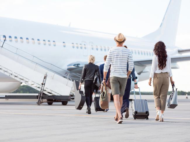 Back view of passengers boarding on the plane. Outdoor shot.Escape 16 April 2023Doc Holiday Photo - Getty Images