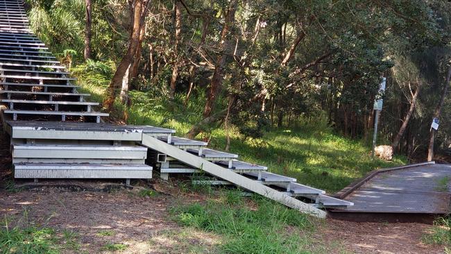 The stairs descending from the bottom of Ross Street to the waterfront dinghy rack and the boardwalk heading east to Glades Bay Reserve.