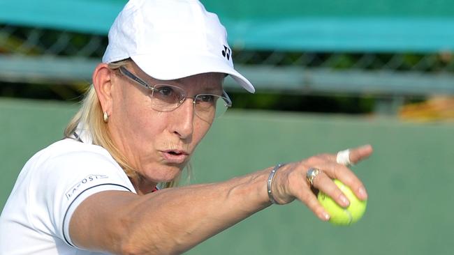 (FILES) This file photo taken on November 26, 2015 shows former US tennis player Martina Navratilova taking part in a mixed doubles exhibition match during the Tennis Masters Hyderabad 2015 at the Sania Mirza Tennis Academy (SMTA) in Hyderabad. Navratilova slammed "sick and dangerous" comments by Australia's Margaret Court that the sport was "full of lesbians" and transgender child were the result of a Nazi-style plot. / AFP PHOTO / NOAH SEELAM