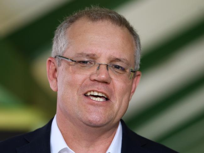 Australian Prime Minister Scott Morrison speaks to the media during a press conference after visiting SMPN 2 Babakan Madang High school in Jakarta, Friday, August 31, 2018. Scott Morrison is in Indonesia for a two-day official visit. (AAP Image/Lukas Coch) NO ARCHIVING