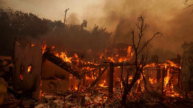 Flames from the Palisades Fire burn a home on in the Pacific Palisades neighbourhood. Picture: Eric Thayer/Getty Images/AFP