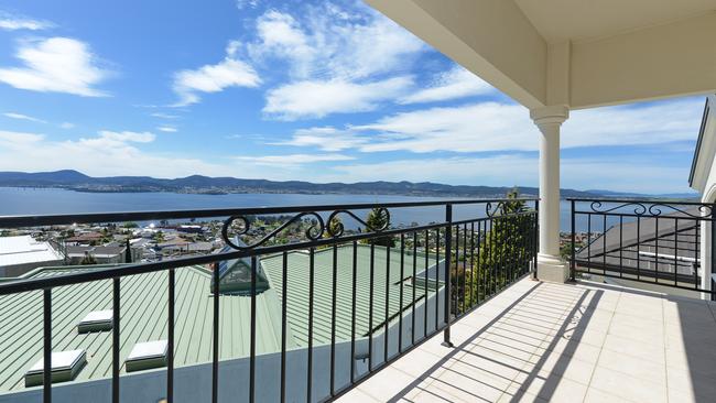 The spacious deck of the Sandy Bay home enjoys all-day sunshine. Picture: SUPPLIED.