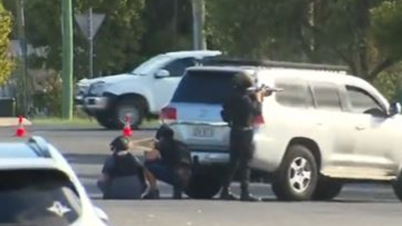 Armed police outside the property on Wantley Street. Picture: 9 News