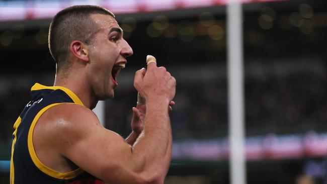 Josh Rachele giving it to Port fans in last week’s Showdown. (Photo by James Elsby/AFL Photos via Getty Images)