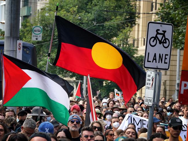 Pro-Palestine and Invasion Day protesters unite at the Invasion Day rally Picture: NCA NewsWire / Luis Enrique Ascui