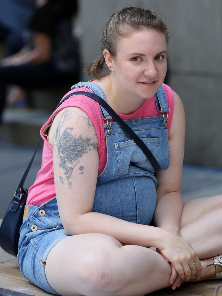 Lena Dunham spotted wearing a prosthetic baby bump on the set of Girls in Soho, New York City. Picture: Getty