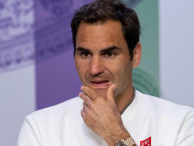 Switzerland's Roger Federer gives a press conference after losing to Serbia's Novak Djokovic in the men's singles final on day thirteen of the 2019 Wimbledon Championships at The All England Lawn Tennis Club in Wimbledon, southwest London, on July 14, 2019. (Photo by Joe TOTH / AELTC / POOL / AFP) / RESTRICTED TO EDITORIAL USE