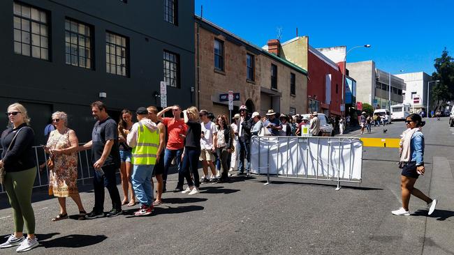 Queues wind up streets and walkways at all four entrances to Salamanca Market. Picture: ANNIE MCCANN.