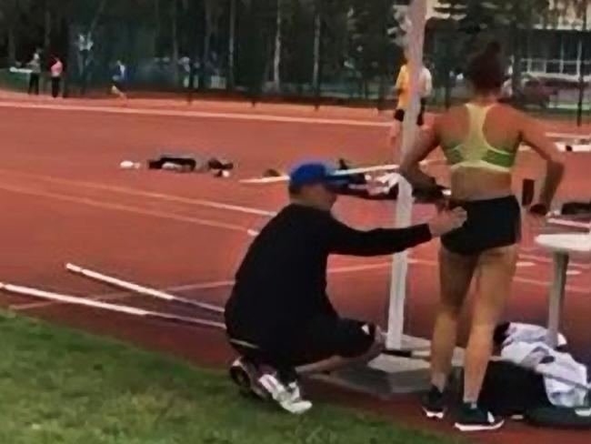 Stills from video posted to Instagram showing coach Alex Parnov stroking the back and bottom of Olympic pole vaulter Nina Kennedy