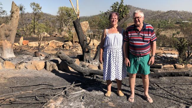 Jenny and Darryl Andersen on their scorched property. Picture: Vanessa Marsh