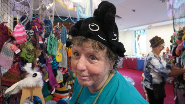 Dozens of volunteers are busy hanging thousands of beanies in preparation for the 28th Alice Springs Beanie Festival. Picture: Gera Kazakov