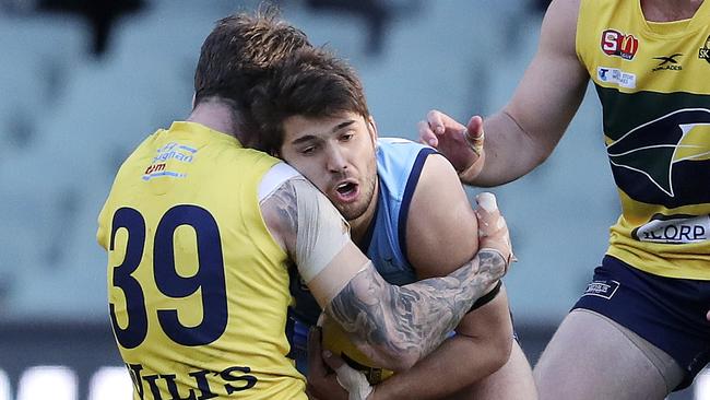 James Battersby runs into Jack Firns and his shoulder. Picture: Sarah Reed