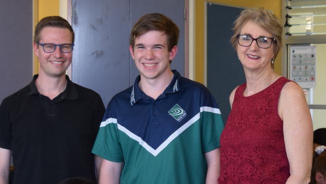 Daniel in class with maths teacher Terry Grimberg and Forest Lake State High School principal Denise Kostowski.