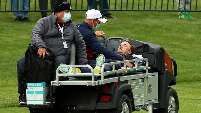 Felton was taken off the course by medics. Picture: Andrew Redington/Getty Images/AFP