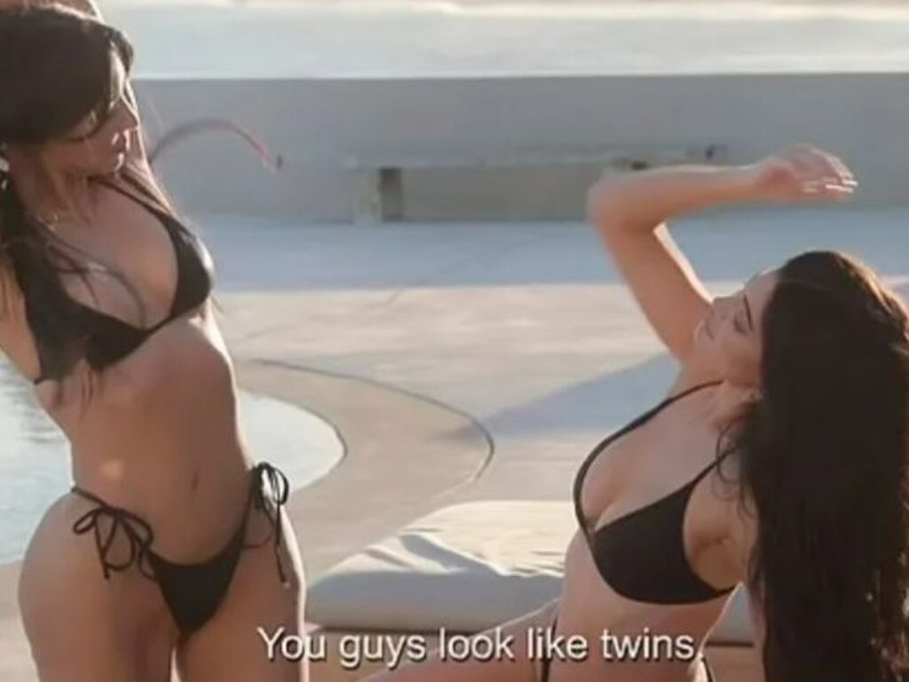 Kim and Kylie both were matching black bikinis. Credit: Hulu