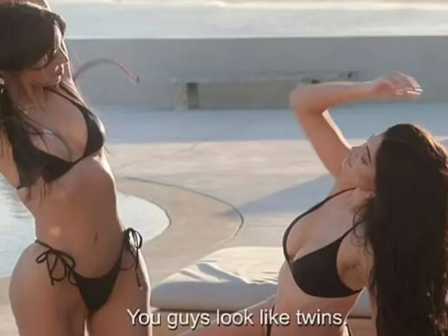 Kim and Kylie both were matching black bikinis. Credit: Hulu
