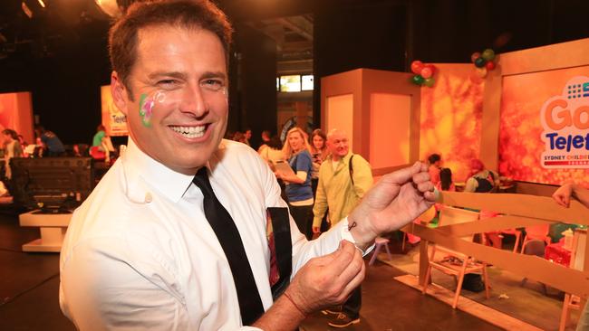 Karl Stefanovic gets a tattoo for the kids at the Gold Telethon taking place at the Channel 9 studios in Artarmon. Picture: Adam Taylor