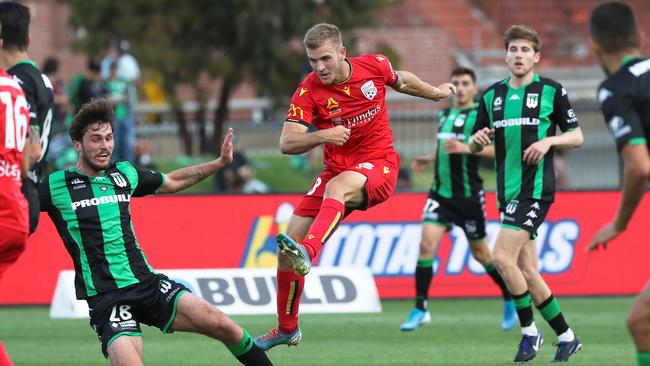 Adelaide’s Riley McGree tries his luck with his left foot against Western United at Whitten Oval. Picture: AAP