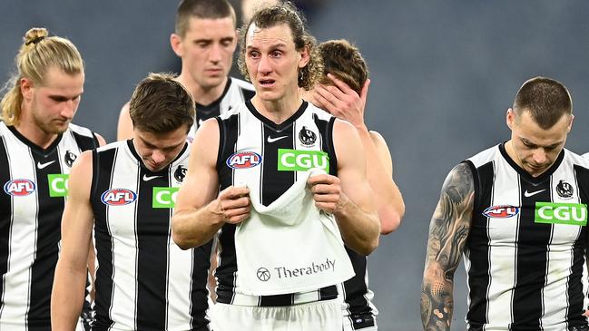 An emotional Chris Mayne leaves the field after his 248th and final AFL game. Picture: Getty Images