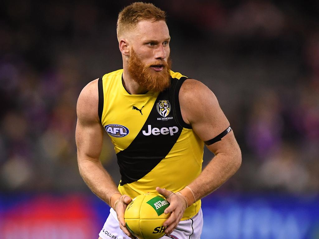 Nick Vlastuin of the Tigers is seen in action during the Round 18 AFL match between the St Kilda Saints and the Richmond Tigers at Etihad Stadium in Melbourne, Friday, July 20, 2018. (AAP Image/Julian Smith) NO ARCHIVING, EDITORIAL USE ONLY