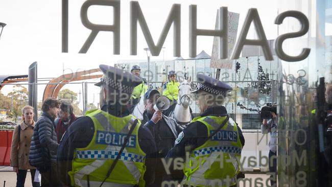 Police maintain guard while the nuclear waste citizens’ jury meets at the SAHMRI building.