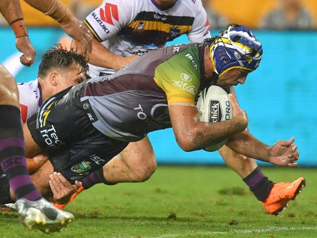 Johnathan Thurston dives over to score a try.