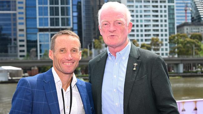 Willie Mullins (right) with Damien Oliver at Crown Casino on Monday. Picture: Vince Caligiuri/Getty Images