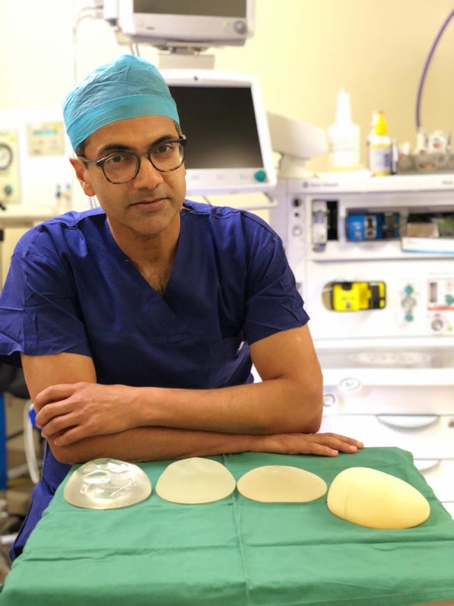 Professor Anand Deva with Breast implants implicated in cancer. Picture: Supplied