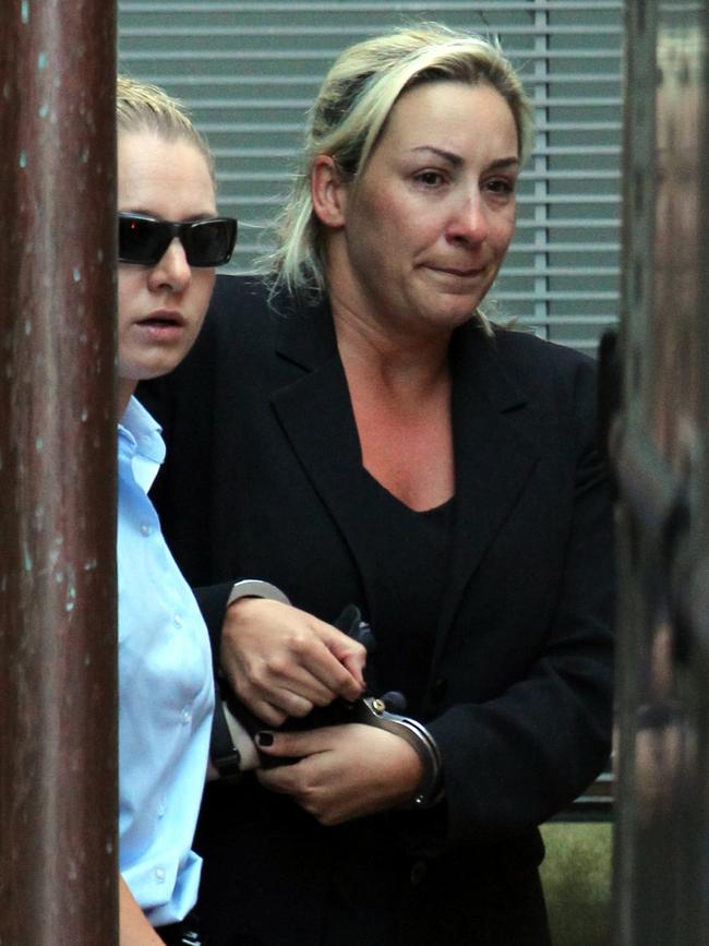 Keli Lane is led away in handcuffs after being convicted of murder. File picture