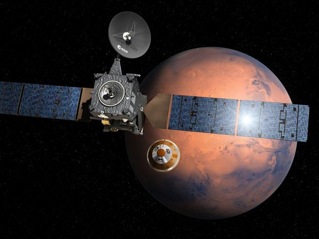 An artist's impression depicting the separation of the ExoMars 2016 entry, descent and landing demonstrator module, named Schiaparelli, from the Trace Gas Orbiter, and heading for Mars. Picture: AFP/ESA